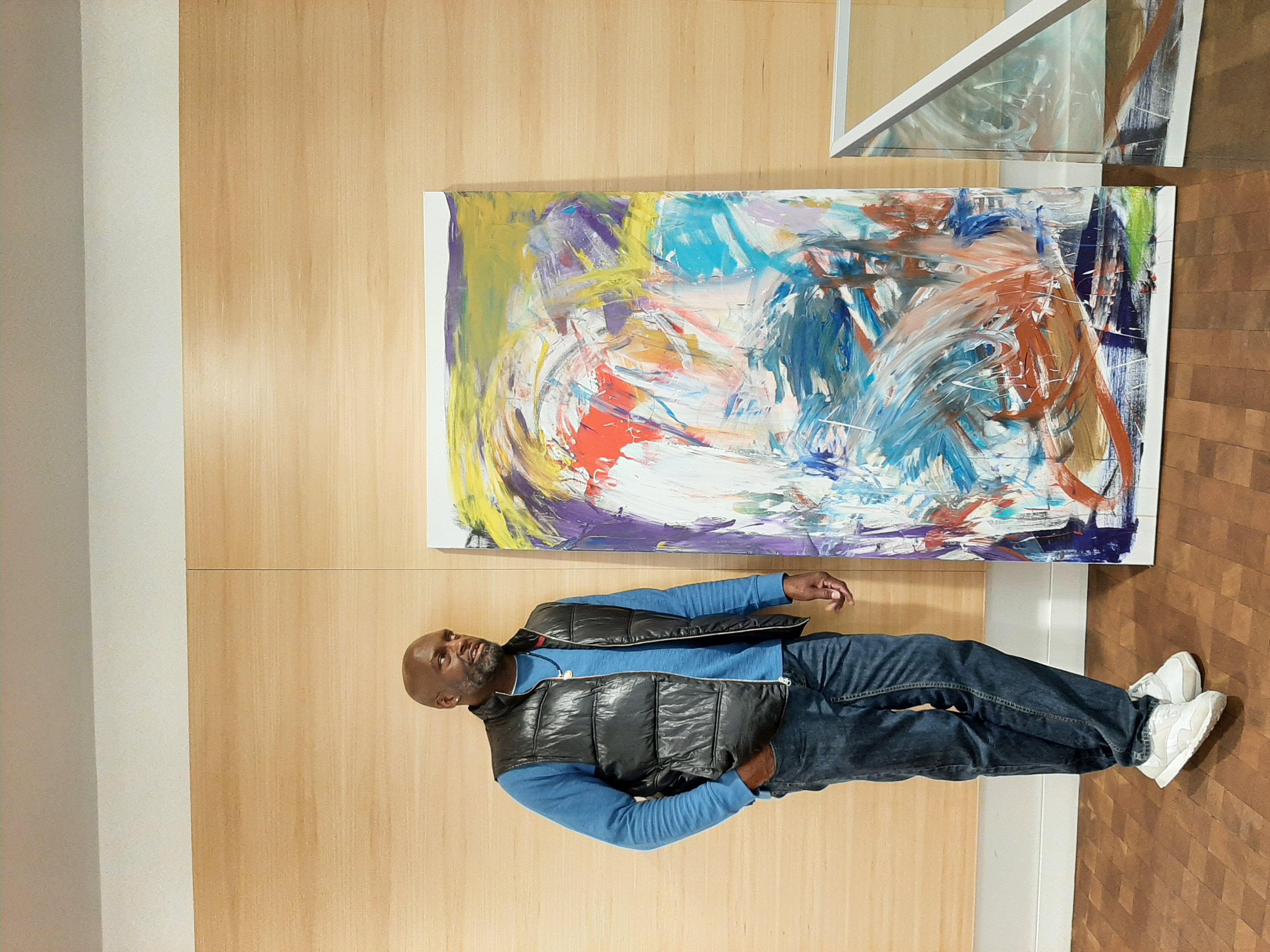 Artist seangarrison with his painting "Tomorrow: Twin Cities"